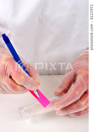write some information on a pink paper 8222951