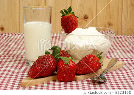 fresh strawberries, yoghurt and milk for breakfast 8223168