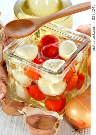 Mozzarella with cherry tomatoes in a jar with oil Mozzarella with cherry tomatoes in a jar with oil 8223243