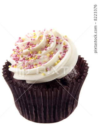 cupcake with butter cream and colored sprinkles 8223376