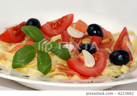 garlic, olive, tomato and pasta with organic basil leaf 8223662
