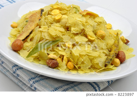 dry roasted chevda on a white plate 8223897