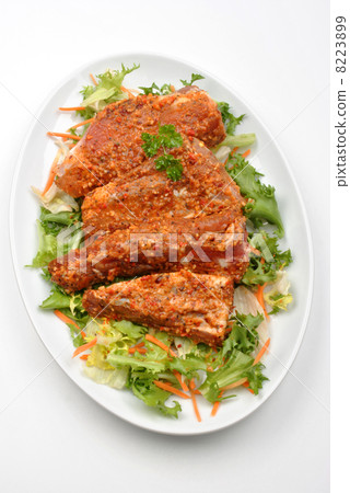 some marinated organic rib on healthy salad some marinated organic rib on healthy salad 8223899