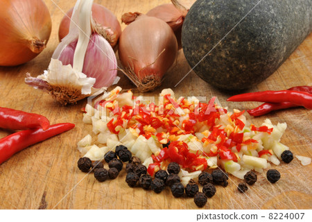 some fresh crushed organic spices and pestle some fresh crushed organic spices and pestle 8224007