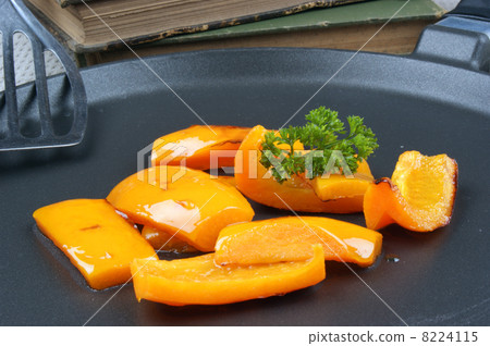 sliced ??and grilled organic peppers on a pan sliced ??and grilled organic peppers on a pan 8224115