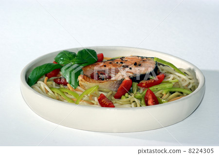 grilled salmon fillet on pasta with basil leaf 8224305