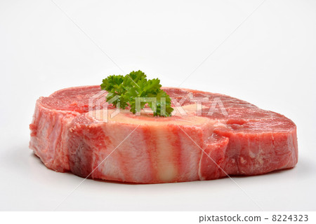 fresh organic beef shin steak and white background 8224323