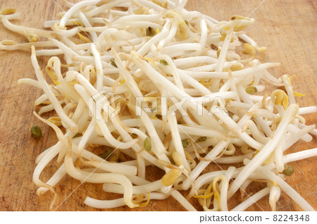 some organic beansprouts on a timber board 8224348