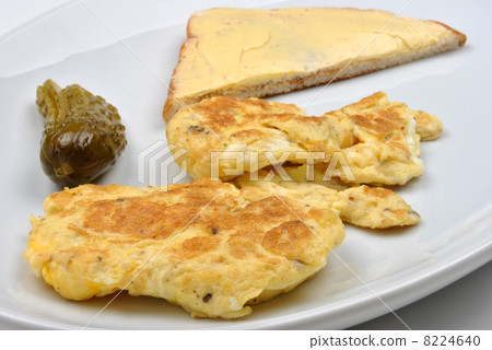 scramled eggs, gherkin and toast on a plate scramled eggs, gherkin and toast on a plate 8224640