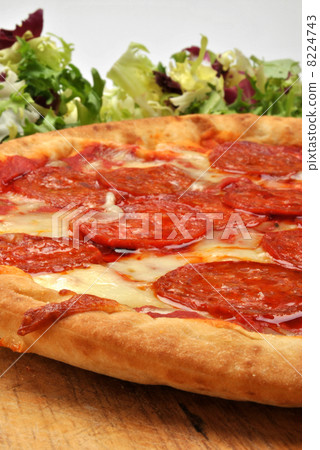 home made italian pizza with salami and cheese home made italian pizza with salami and cheese 8224743