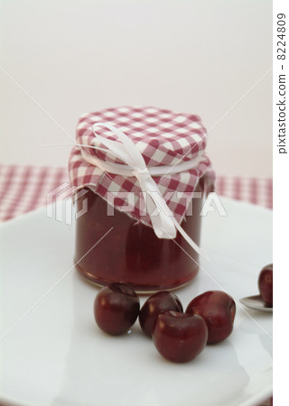 cherry jam on a white plate cherry jam on a white plate 8224809