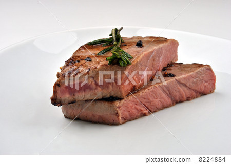 grilled steak with organic rosemary and bright background grilled steak with organic rosemary and bright background 8224884