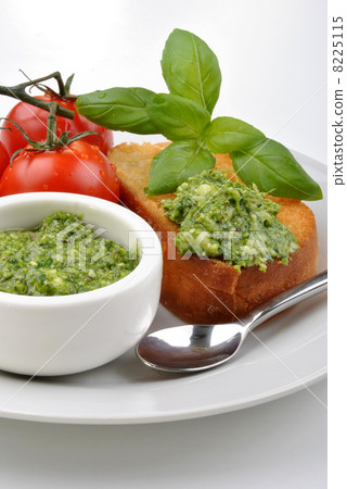 baguette as a snack with homemade fresh pesto 8225115
