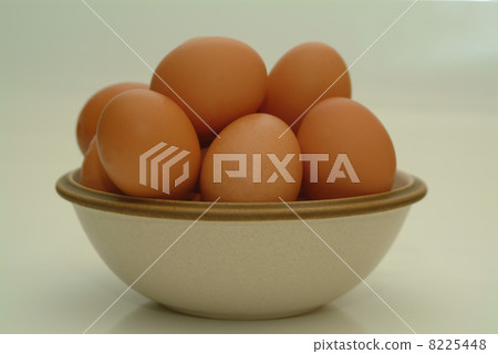 brown eggs in a basket/bowl 8225448