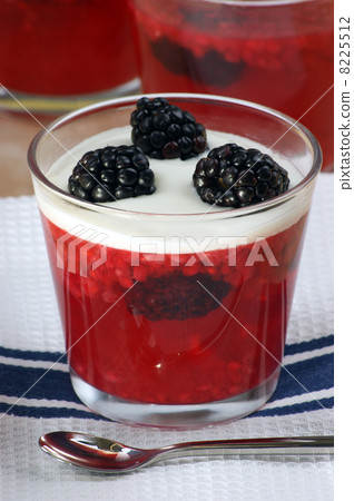 fruit jelly with cream in a glass fruit jelly with cream in a glass 8225512