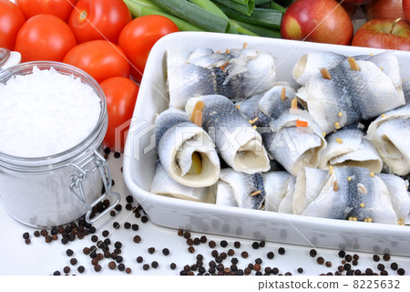 some fresh organic rollmops on a white plate some fresh organic rollmops on a white plate 8225632