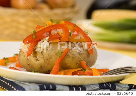 boiled potato with organic paprika on a plate boiled potato with organic paprika on a plate 8225640
