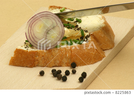 organic home made bread with butter and a knife 8225863