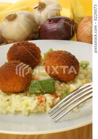 meatballs with organic rice on a plate 8226073