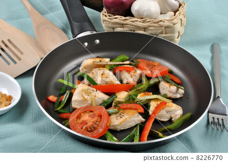 roasted delicious chicken and tomato in a pan 8226770