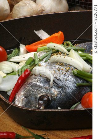 organic sea bream from greece with vegetable organic sea bream from greece with vegetable 8226771