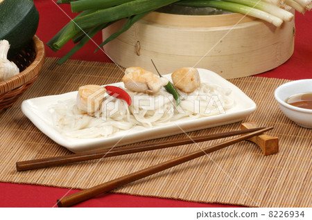 asian style noodle and chicken on a plate asian style noodle and chicken on a plate 8226934