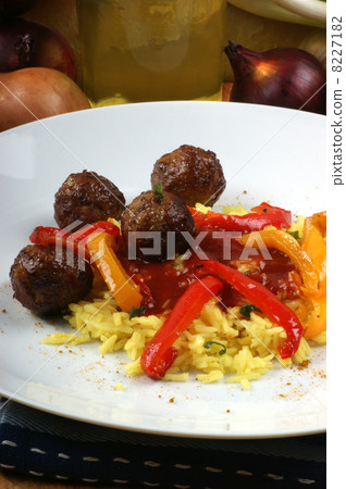 meatballs with organic curryrice on a plate meatballs with organic curryrice on a plate 8227182