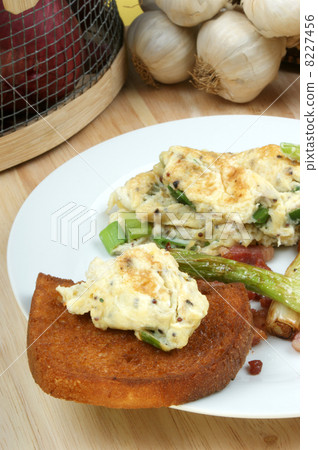 scrambled eggs with toast bread on a plate scrambled eggs with toast bread on a plate 8227456