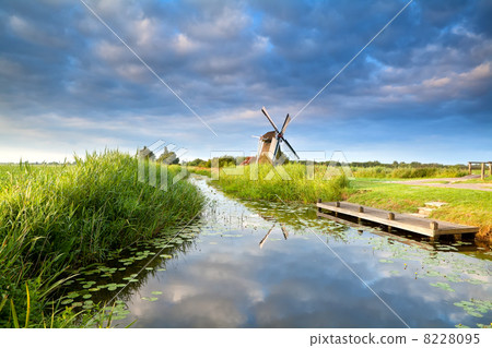 Dutch windmill and blue morning sky Dutch windmill and blue morning sky 8228095