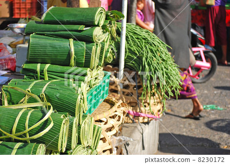 Vegetables banana leaves green leaves market food ingredients organic vegetables home gardens organic food education agricultural products seasonal vegetable plant food food ingredients food health services service selling outdoor stands blue sky market southeast asia tropical south 8230172