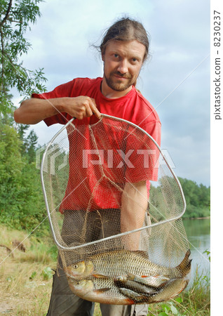 Fisherman and a fish 8230237