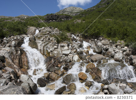 Waterfall near Buarbreen glacier (Folgefonna National Park, Norw 8230371
