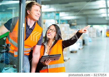 Forklift driver and supervisor at warehouse Forklift driver and supervisor at warehouse 8237054