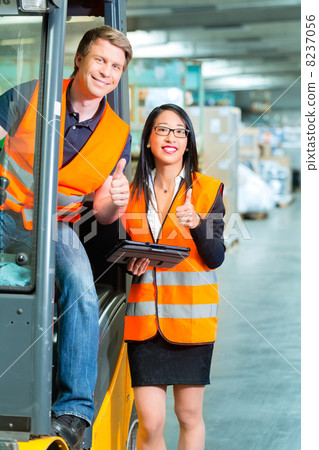 Forklift driver and supervisor at warehouse Forklift driver and supervisor at warehouse 8237056