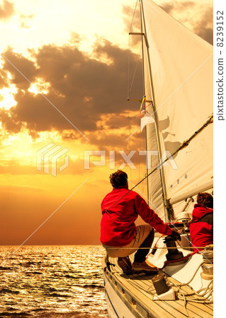 People on sailing boat in the sea People on sailing boat in the sea 8239152