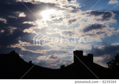 Genoese fortress silhouette with blue sky and clouds Genoese fortress silhouette with blue sky and clouds 8239164