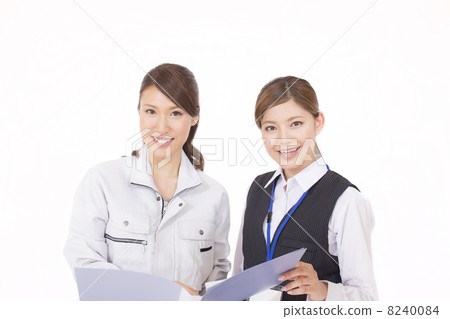 Female workers and clerks looking at files 8240084