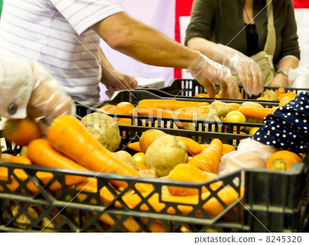Grabbing vegetables (with hands) Grabbing vegetables (with hands) 8245320