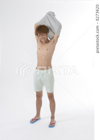 A young woman in a bathing suit 8273620