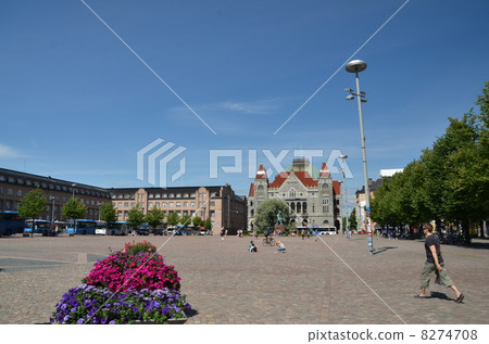 Helsinki Central Station square surrounded by neo-classical style building 8274708