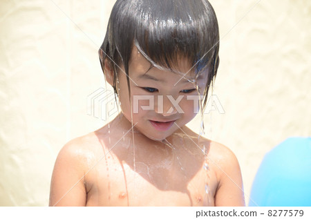 Children playing pool in the garden Children playing pool in the garden 8277579