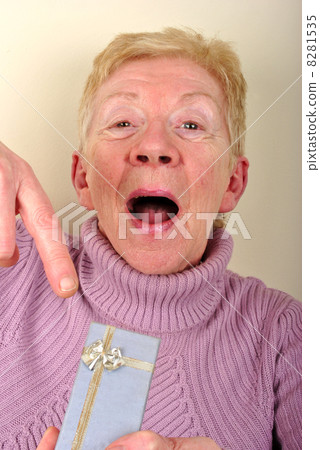 woman is happy about her new present 8281535