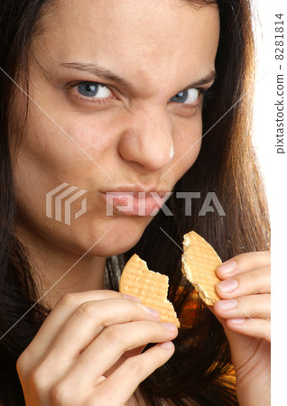 a young woman likes her home made biscuit 8281814