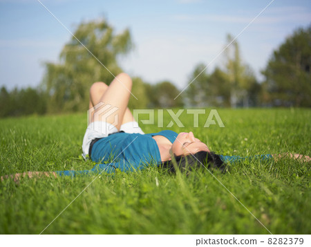 Woman Lie on grass Woman Lie on grass 8282379