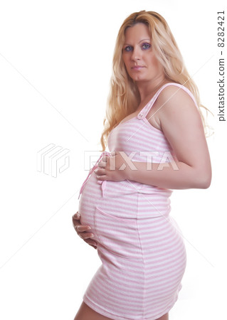 Pregnant woman holding tummy Pregnant woman holding tummy 8282421