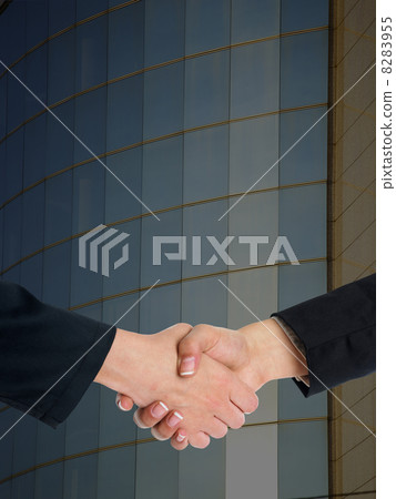 Architectural Handshaking in front of building 8283955