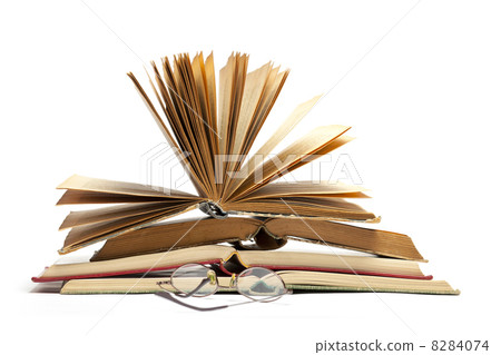 Open Old Books and Eyeglasses 8284074