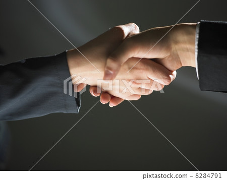 Handshake Handshaking on light and dark 8284791