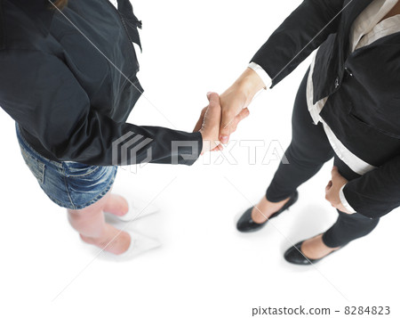 Handshake Handshaking of two business woman 8284823