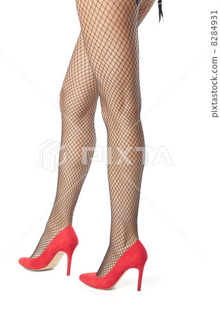 Girl legs in fishnet stocking 8284931